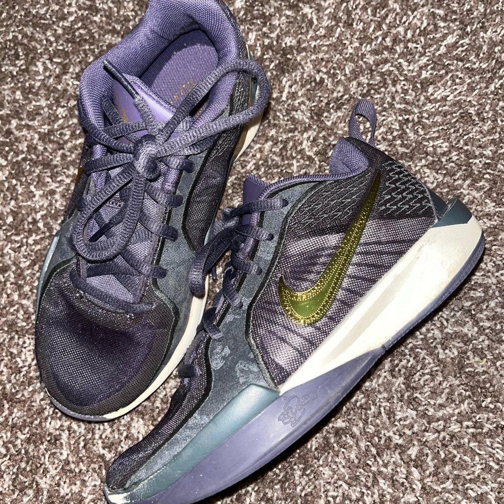 Nike kids Dark Purple and Gold Athletic Shoes